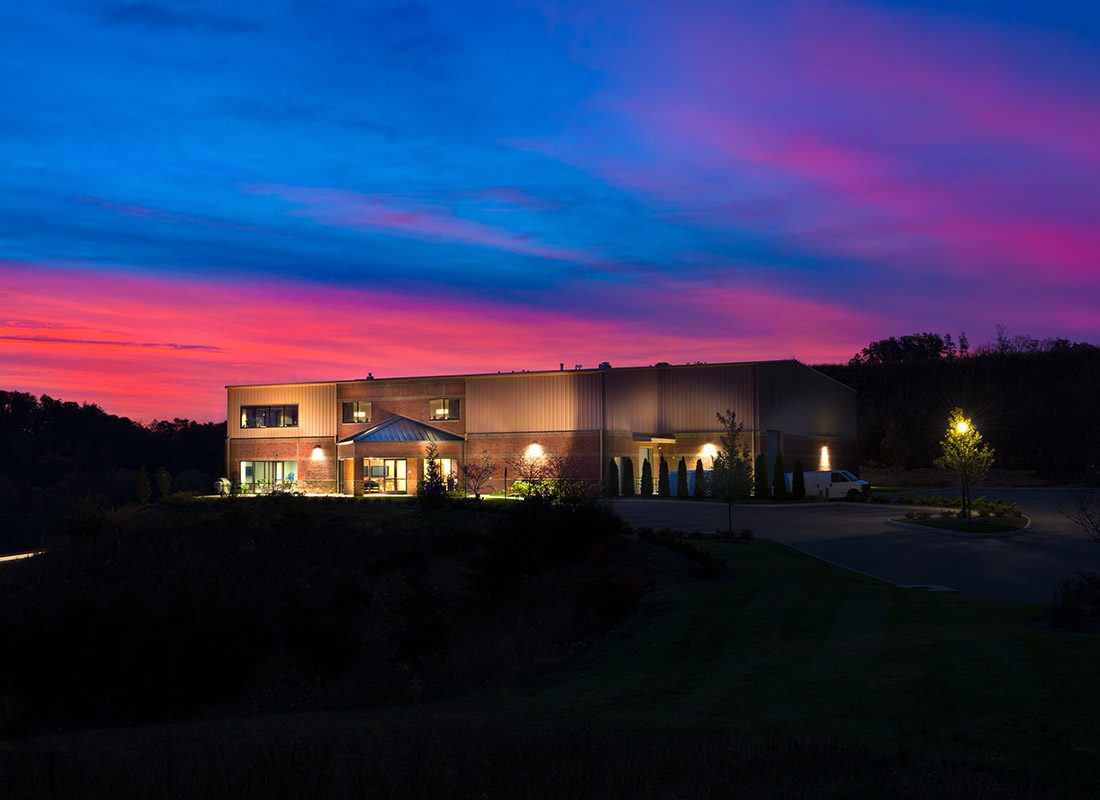 Knoxville, TN - View of the Jessup Office Building at Sunset with Red, Pink, and Blue Sky